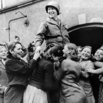 1944: Lt. J.B. Keeley of Houston, Texas, Is Raised By Ukrainian Girls In Celebration of Their Liberation From German Slavery