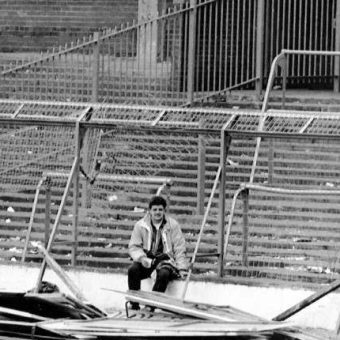 Hillsborough In Photos: A Lone Liverpool Fan Sits On The Broken Terraces