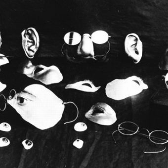 Faceless Men Behind Copper Masks At The Tin Nose Shop (1918)