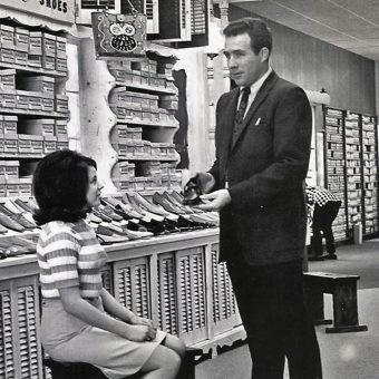 Vintage Images of Women Shoe Shopping (And The Humble Salesmen That Served Them)